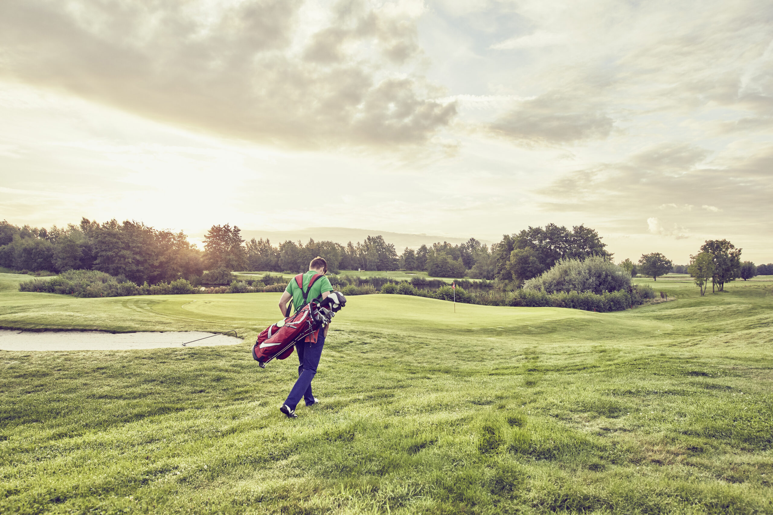 Golfer walking on course, Korschenbroich, Dusseldorf, Germany